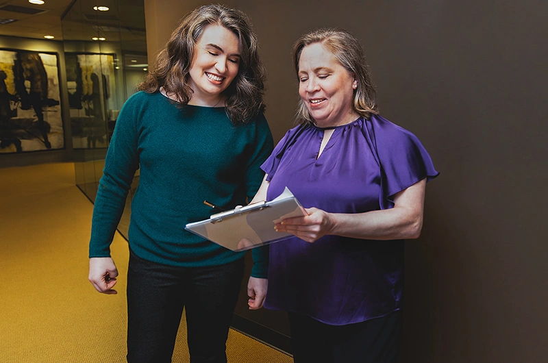 Discussion between two staff members