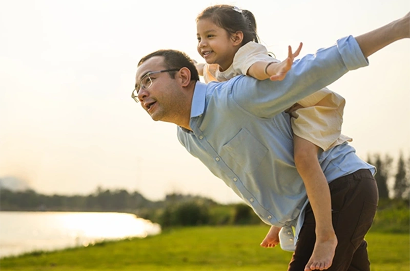 Father and daughter playing